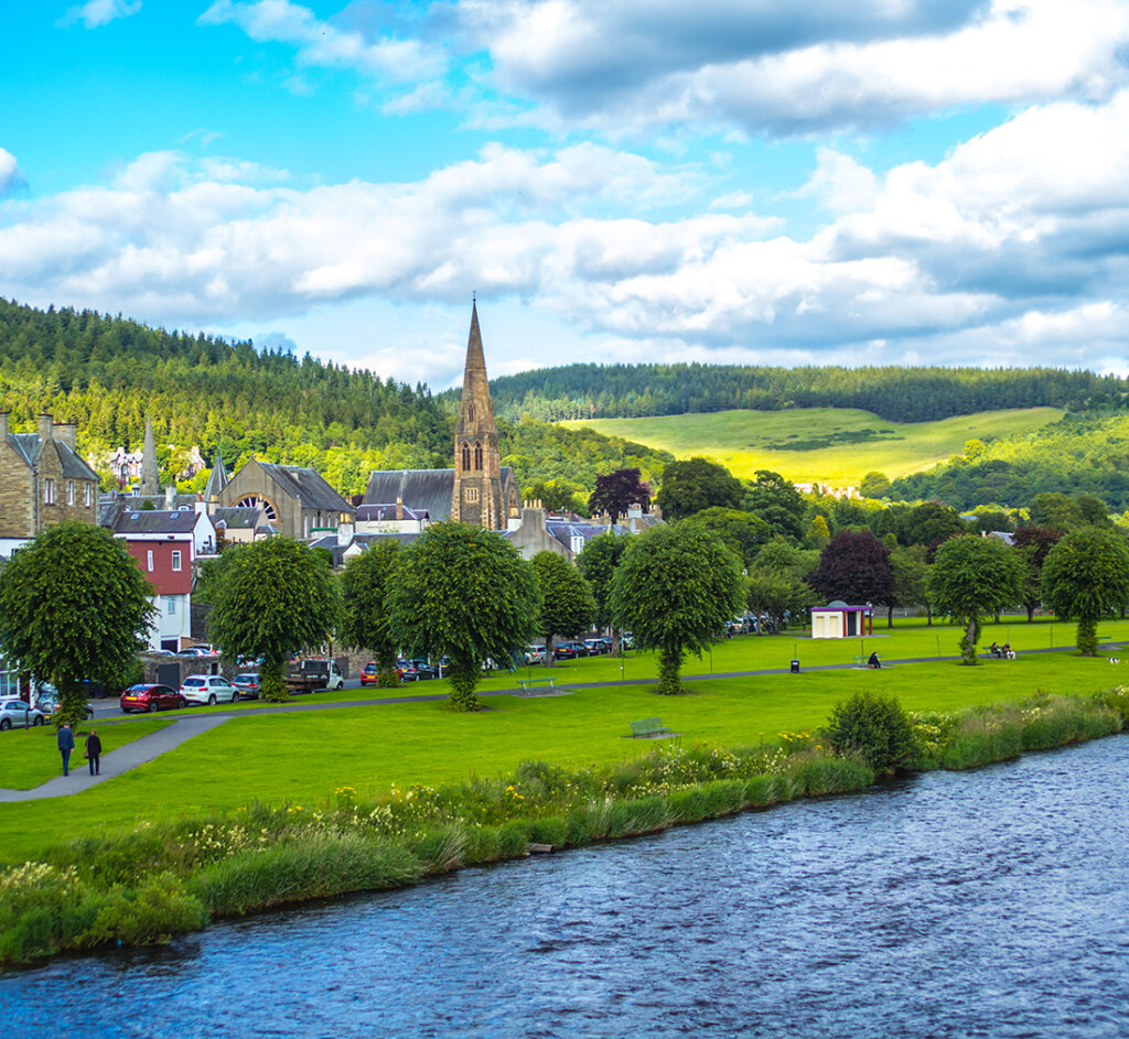 Peebles with the river Tweed and woodland in the hills
