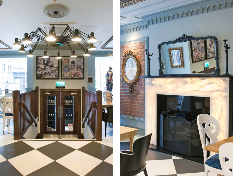 Entrance, dining area and marble fireplace with black and white checkered flooring at the Guildhall & Linen Exchange pub
